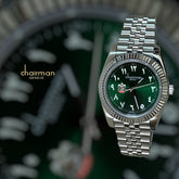 ساعة أبو ظبي للرجال بمينا عربية خضراء وسلسلة فضية من تشارمير جينيف