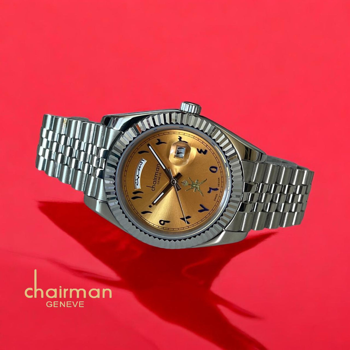 Swiss Design Chairman Geneve Day And Dated Orange Dial Silver Chain Gents Watch