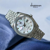 ساعة رجالية من مجموعة تشيرمان جينيف بسلسلة فضية وميناء من الرخام الأبيض وتاريخها