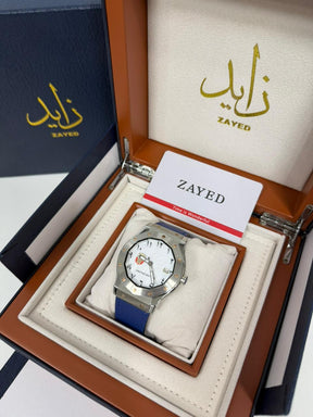 Zayed watch in a branded box with a  UAE Logo and blue strap.