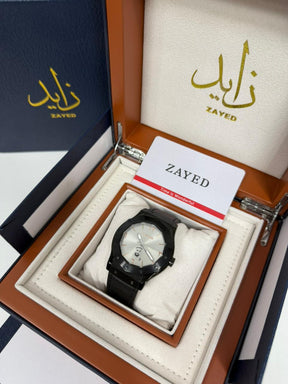 Zayed watch in a branded box with visible branding